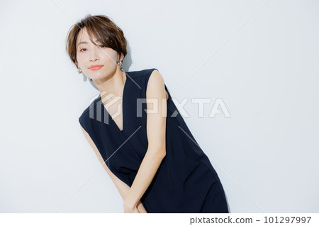 A woman with short hair A woman with short hair 101297997