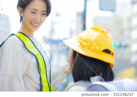 Elementary school girl walking on the school road Elementary school girl walking on the school road 101298287