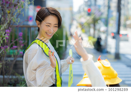 Elementary school girl walking on the school road 101298289