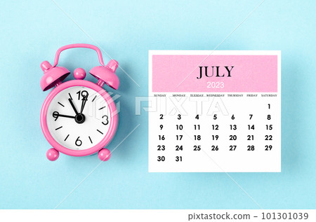 The July 2023 Monthly calendar year with pink alarm clock on blue colour background. 101301039