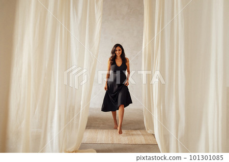 Studio snapshot of young woman expecting baby. Studio snapshot of young woman expecting baby. 101301085