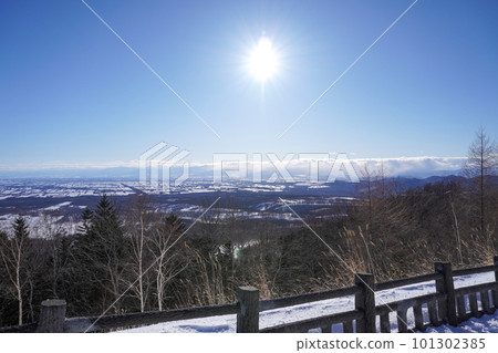 Tokachi plain seen from Ogigahara observatory in winter Tokachi plain seen from Ogigahara observatory in winter 101302385
