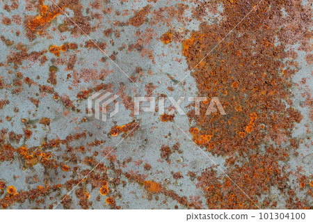 Rusty metal textured background closeup 101304100
