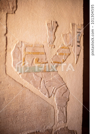 Different hieroglyphs on the walls and columns in the Karnak temple. Karnak temple is the largest complex in ancient Egypt. Different hieroglyphs on the walls and columns in the Karnak temple. Karnak temple is the largest complex in ancient Egypt. 101304595