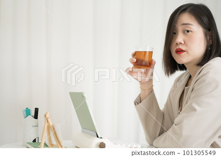 asian business and writer woman meeting online and typing by use retro keyboard and tablet asian business and writer woman meeting online and typing by use retro keyboard and tablet 101305549