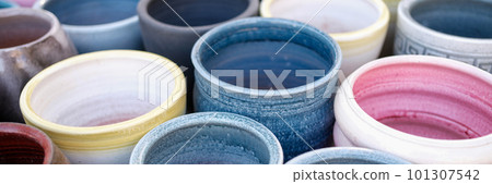 Empty ceramic flower pots in greenhouse or hothouse 101307542