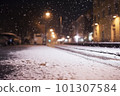 snowy street. slush and snow in the city. 101307584