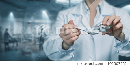 Doctor pouring medicine into the cover for the treatment . Doctor pouring medicine into the cover for the treatment . 101307931