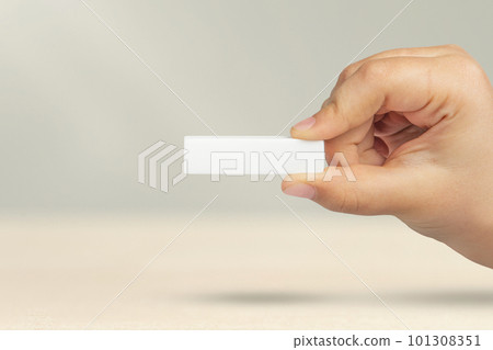 Minus sign in hand. White minus sign in a child's hand on a gray background. Subtraction or reduction of something, removal, subtraction or reduction. Suitable for pasting into a project or design Minus sign in hand. White minus sign in a child's hand on a gray background. Subtraction or reduction of something, removal, subtraction or reduction. Suitable for pasting into a project or design 101308351