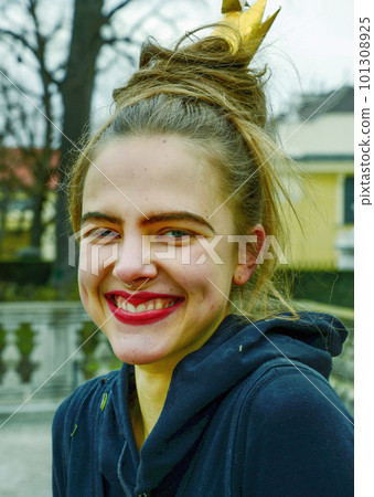 Young woman (girl) with make-up of a fairy-tale forest character - goblin Young woman (girl) with make-up of a fairy-tale forest character - goblin 101308925