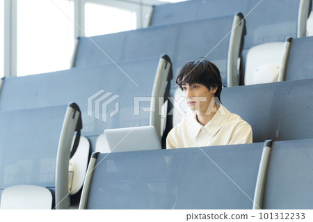 Photo of college students taking classes 101312233