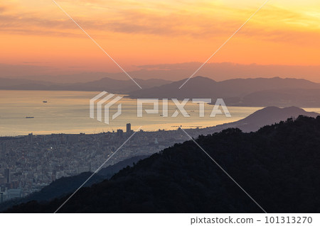 Kobe cityscape and Osaka Bay during magic hour seen from Mt. Rokko Observatory in Kobe City, Hyogo Prefecture, Japan Kobe cityscape and Osaka Bay during magic hour seen from Mt. Rokko Observatory in Kobe City, Hyogo Prefecture, Japan 101313270