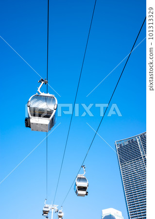 Urban landscape with ropeway running under the blue sky d-1 Urban landscape with ropeway running under the blue sky d-1 101313329