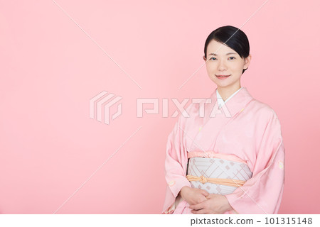 A woman in a kimono A woman in a kimono 101315148