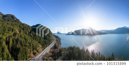 Aerial View of Sea to Sky Highway in Howe Sound. Sunset Sky. 101315899