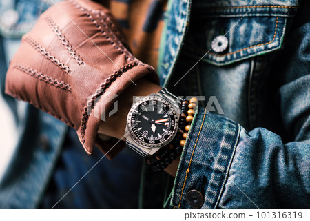 watch on wrist of man watch on wrist of man 101316319
