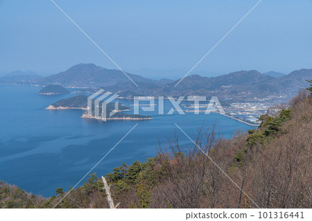 The Seto Inland Sea and cityscape seen from the approach to the sky torii of Takaya Shrine on the top of Mt. Inazumi in Kanonji City, Kagawa Prefecture, Japan The Seto Inland Sea and cityscape seen from the approach to the sky torii of Takaya Shrine on the top of Mt. Inazumi in Kanonji City, Kagawa Prefecture, Japan 101316441