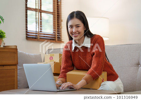 Small businesses SME owners female entrepreneurs check online orders to prepare to pack the boxes, sell to customers, sme business ideas online 101316949