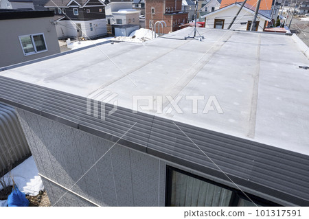 Aerial view of dented eaves due to snow damage (before and after housing renovation) 101317591