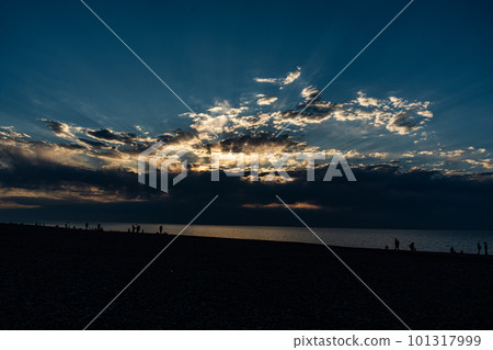Dramatic sunset on the beach of Batumi 101317999