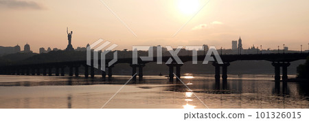Kiev, Ukraine May 1, 2020: Paton Bridge over the Dnieper River, aging, rusting and requiring repair 101326015
