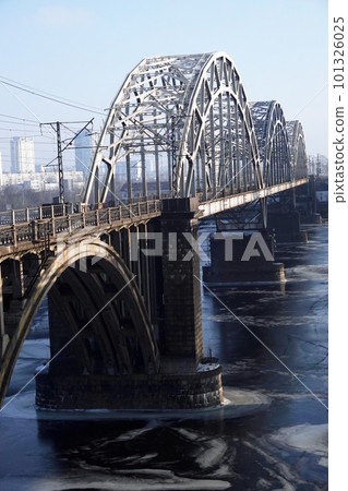 Kiev, Ukraine January 23, 2021: railway bridge over the Dnieper river 101326025