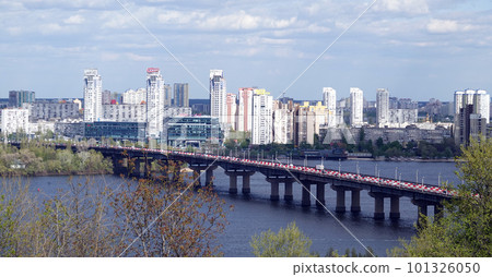 Kiev, Ukraine April 27, 2020: bridge over the Dnieper River, named after Paton, with red road traffic restrictions 101326050