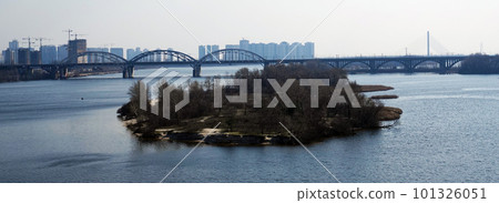 Kiev, Ukraine March 18, 2020: railway bridge over the Dnieper River Kiev, Ukraine March 18, 2020: railway bridge over the Dnieper River 101326051