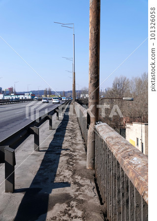 Kiev, Ukraine March 18, 2020: South bridge over the Dnieper River, aging, rusting and requiring repair 101326058
