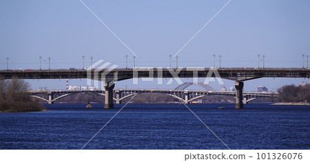 Kiev, Ukraine March 13, 2020: Paton Bridge over the Dnieper River, aging, rusting and requiring repair 101326076