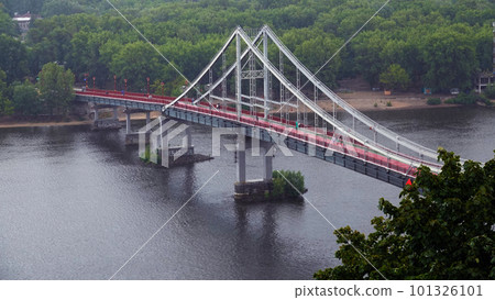 Kiev, Ukraine July 12, 2019: Park pedestrian bridge on Trukhanov Island in the city of Kiev Ukraine 101326101