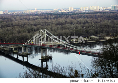 Kiev, Ukraine July 12, 2019: Park pedestrian bridge on Trukhanov Island in the city of Kiev Ukraine 101326103