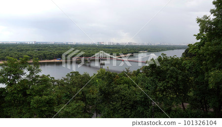 Kiev, Ukraine July 12, 2019: Park pedestrian bridge on Trukhanov Island in the city of Kiev Ukraine 101326104
