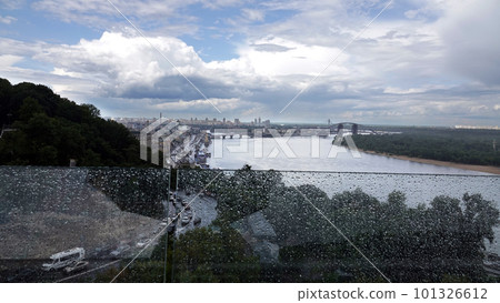 Kiev, Ukraine July 12, 2019: Pedestrian-bicycle bridge over Vladimirsky Descent, in the center of Kiev Ukraine Kiev, Ukraine July 12, 2019: Pedestrian-bicycle bridge over Vladimirsky Descent, in the center of Kiev Ukraine 101326612