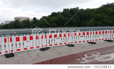 Kiev, Ukraine July 12, 2019: Pedestrian-bicycle bridge over Vladimirsky Descent, in the center of Kiev Ukraine Kiev, Ukraine July 12, 2019: Pedestrian-bicycle bridge over Vladimirsky Descent, in the center of Kiev Ukraine 101326613