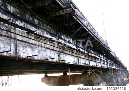 Kiev, Ukraine January 21, 2020: City, Kiev bridge over the Dnieper river, named after Paton, aging, rusting and requiring repair Kiev, Ukraine January 21, 2020: City, Kiev bridge over the Dnieper river, named after Paton, aging, rusting and requiring repair 101326618