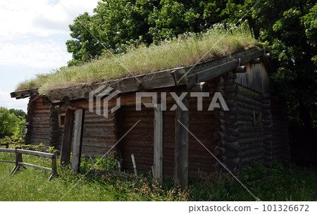 Kiev, Ukraine June 19, 2021: Old wooden house - entertainment complex Kievskaya Rus Kiev, Ukraine June 19, 2021: Old wooden house - entertainment complex Kievskaya Rus 101326672