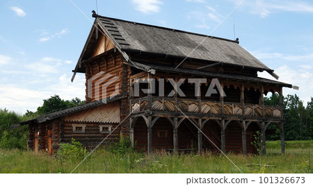 Kiev, Ukraine June 19, 2021: Old wooden house - entertainment complex Kievskaya Rus Kiev, Ukraine June 19, 2021: Old wooden house - entertainment complex Kievskaya Rus 101326673