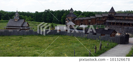 Kiev, Ukraine June 19, 2021: old wooden fortress - entertainment complex Kievan Rus old wooden fortress and artists doing a performance. Kiev, Ukraine June 19, 2021: old wooden fortress - entertainment complex Kievan Rus old wooden fortress and artists doing a performance. 101326678