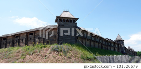 Kiev, Ukraine June 19, 2021: old wooden fortress - entertainment complex Kievan Rus old wooden fortress and artists doing a performance. 101326679