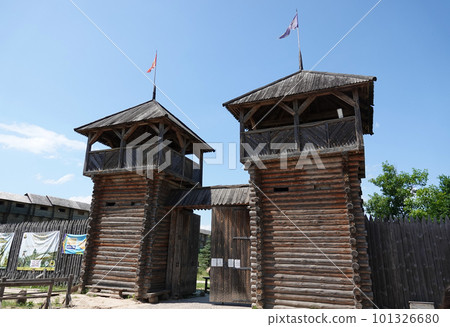 Kiev, Ukraine June 19, 2021: old wooden fortress - entertainment complex Kievan Rus old wooden fortress and artists doing a performance. 101326680