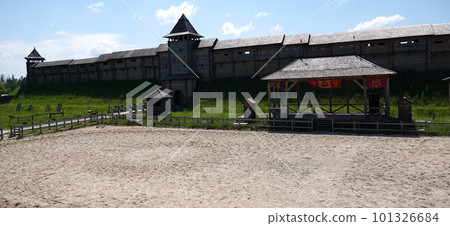 Kiev, Ukraine June 19, 2021: old wooden fortress - entertainment complex Kievan Rus old wooden fortress and artists doing a performance. 101326684