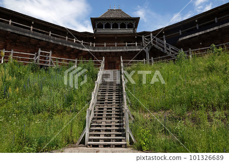 Kiev, Ukraine June 19, 2021: old wooden fortress - entertainment complex Kievan Rus old wooden fortress and artists doing a performance. Kiev, Ukraine June 19, 2021: old wooden fortress - entertainment complex Kievan Rus old wooden fortress and artists doing a performance. 101326689