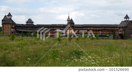 Kiev, Ukraine June 19, 2021: old wooden fortress - entertainment complex Kievan Rus old wooden fortress and artists doing a performance. Kiev, Ukraine June 19, 2021: old wooden fortress - entertainment complex Kievan Rus old wooden fortress and artists doing a performance. 101326690