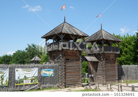 Kiev, Ukraine June 19, 2021: old wooden fortress - entertainment complex Kievan Rus old wooden fortress and artists doing a performance. Kiev, Ukraine June 19, 2021: old wooden fortress - entertainment complex Kievan Rus old wooden fortress and artists doing a performance. 101326691
