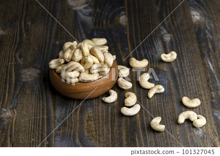 Fresh peeled cashew nuts on the table Fresh peeled cashew nuts on the table 101327045