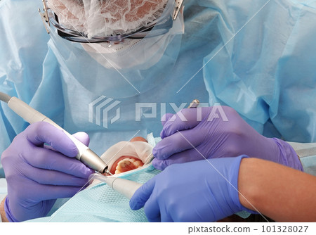 Kiev, Ukraine August 22, 2020: Dentist doctor works with a patient close-up 101328027