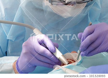 Kiev, Ukraine August 22, 2020: Dentist doctor works with a patient close-up Kiev, Ukraine August 22, 2020: Dentist doctor works with a patient close-up 101328093