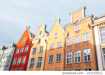 Architecture of the old town in Gdansk with city hall at dawn, Poland. Gdansk is the historical capital of Polish Pomerania with beautiful architecture. 101335012