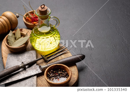 Various dried spices in small bowls 101335340